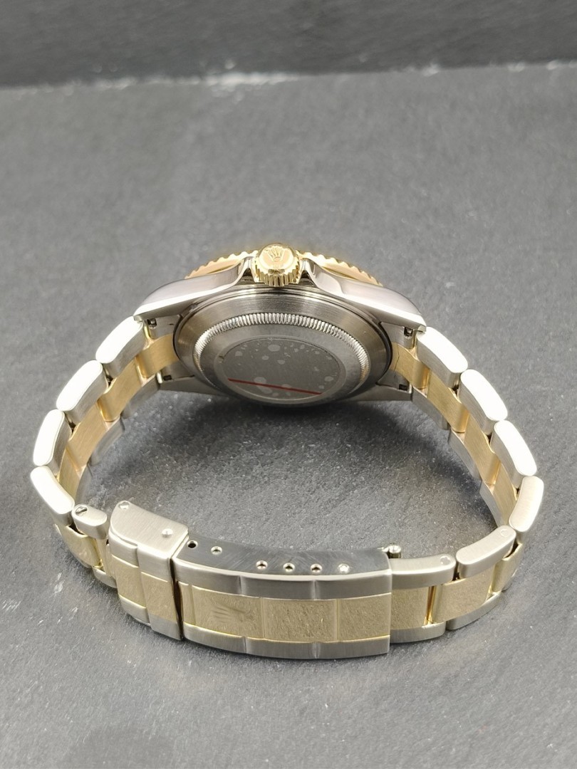 Buy Rolex Submariner - steel/gold - sel - no holes - Ref. 16613