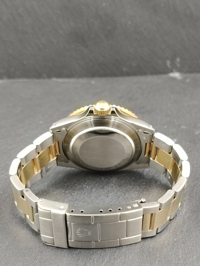Buy Rolex Submariner steel/yellow gold - Transitional - Ref. 16803